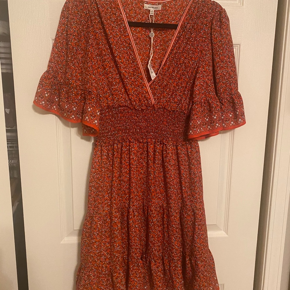 Brand new, red, sleeved dress.